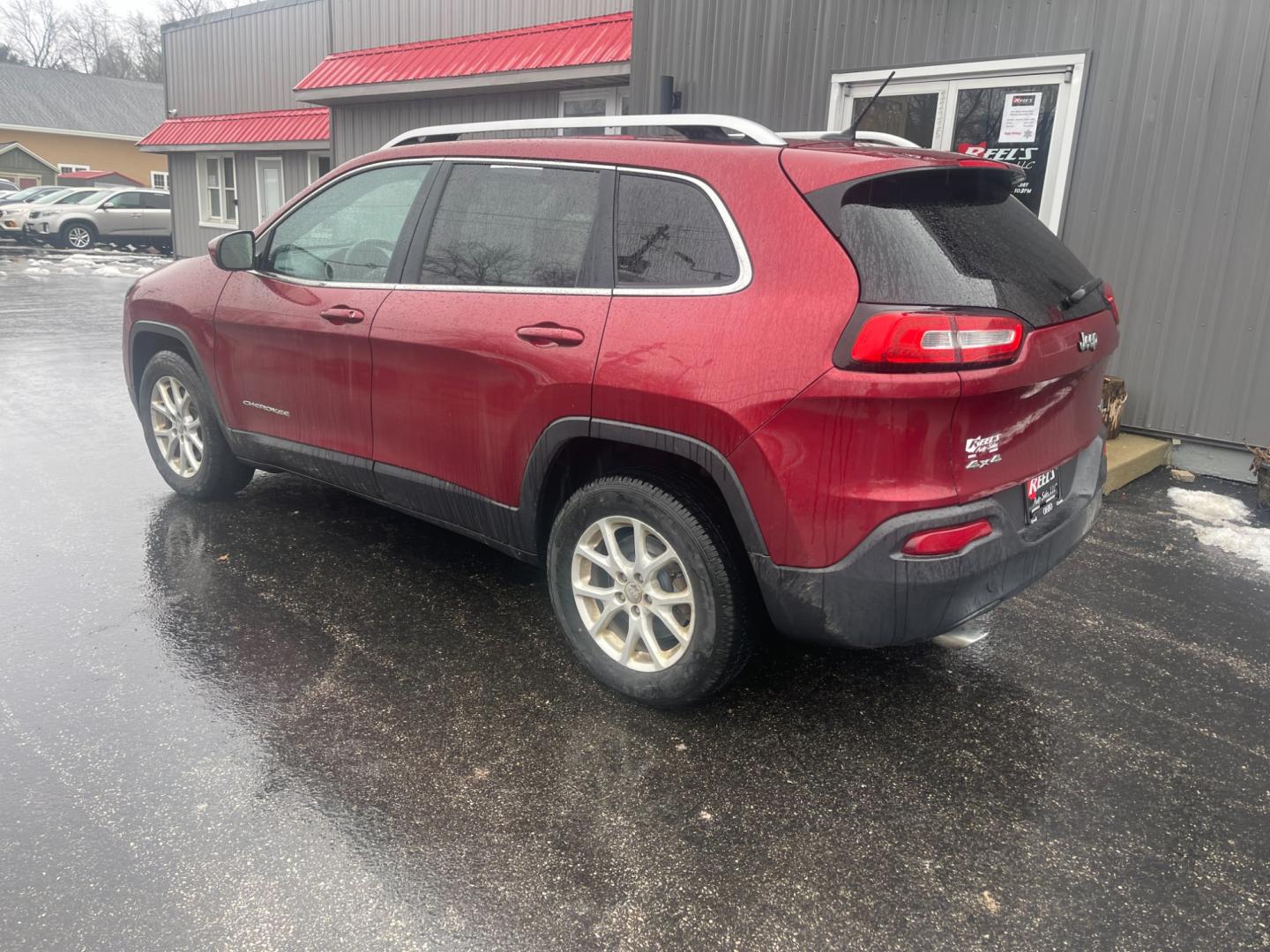 2014 Red /Black Jeep Cherokee Latitude 4WD (1C4PJMCB7EW) with an 2.4L I4 DOHC 16V engine, 9-Speed Automatic transmission, located at 11115 Chardon Rd. , Chardon, OH, 44024, (440) 214-9705, 41.580246, -81.241943 - Photo#11